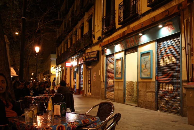 Calle de Argumosa terraces after dark